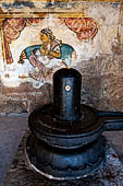 The great Chola temples of Tamil Nadu - The Brihadishwara Temple of Thanjavur. Linga with Nayaka painting on the inside wall of the cloister. 